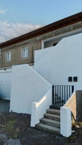 a set of stairs in front of a building at Apartamento nuevo cerca de la costa y a 15 min de Bilbao! in Urduliz