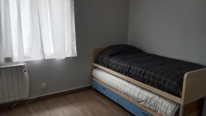 Posteľ alebo postele v izbe v ubytovaní Apartamento nuevo cerca de la costa y a 15 min de Bilbao!