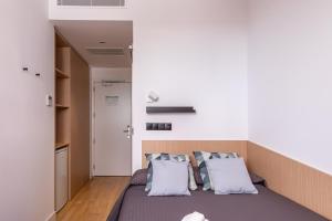 Posteľ alebo postele v izbe v ubytovaní Residencia Universitaria Resa Málaga Centro