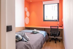 Posteľ alebo postele v izbe v ubytovaní Residencia Universitaria Resa Málaga Centro