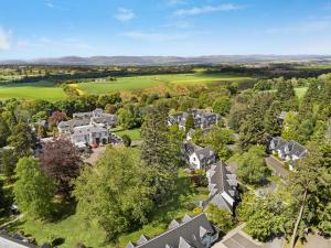 an aerial view of a residential neighborhood with houses at Wyndham Duchally Country Estate in Auchterarder
