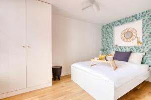 Postel nebo postele na pokoji v ubytování Le Roi Soleil T2 en plein cœur De Ville !