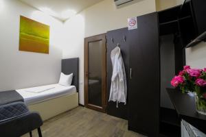 Ένα ή περισσότερα κρεβάτια σε δωμάτιο στο Elysium Gallery Hotel