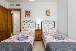 Säng eller sängar i ett rum på Fuengirola center, 3 bedrooms, and parking