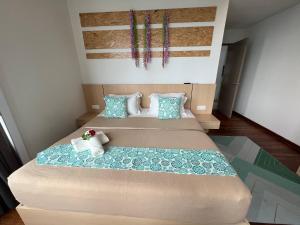 Postel nebo postele na pokoji v ubytování D'Gunduls Homestay Family Suite 2R 2B by DGH I-CITY