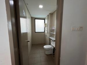 Koupelna v ubytování D'Gunduls Homestay Family Suite 2R 2B by DGH I-CITY