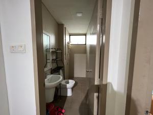 Koupelna v ubytování D'Gunduls Homestay Family Suite 2R 2B by DGH I-CITY