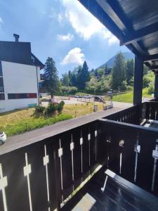 a balcony with a view of a parking lot at Carè Alto in Vason