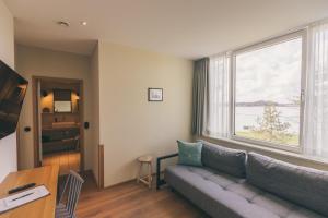 TV a/nebo společenská místnost v ubytování Hotel Strandleben