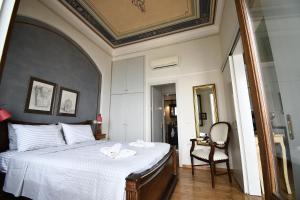 Postel nebo postele na pokoji v ubytování anoi tholos