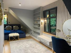 Posezení v ubytování MazuryDreamHouse