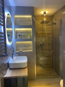Koupelna v ubytování MazuryDreamHouse + 37 fotografií