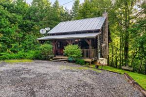 a cabin in the woods with a gravel driveway at Beary Patch Hill Hot Tub 9 Miles to Great Smoky Mtn National Park in Sevierville +22 photos