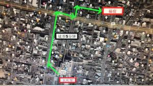 a map of a city with a green arrow at 福宿 Fukuinn 201号室 in Takamatsu