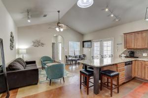 a kitchen and living room with a table and chairs at Marquesas #310 in Padre Island