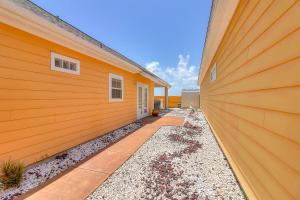 a side view of a house with a garage at Marquesas #310 in Padre Island