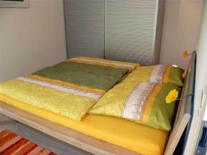 Łóżko lub łóżka w pokoju w obiekcie Ferienwohnung am Bienenfeld