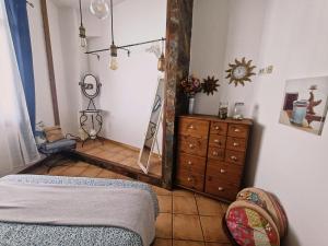 Łóżko lub łóżka w pokoju w obiekcie La Casita del acantilado