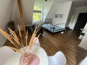 Posteľ alebo postele v izbe v ubytovaní Apartament Willa Bellevue