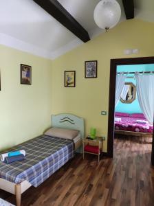 Postel nebo postele na pokoji v ubytování Borgo Lamurese + 37 fotografií