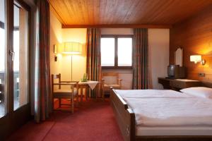 Cama o camas de una habitación en Krone Hittisau - Hotel & Restaurant im Bregenzerwald