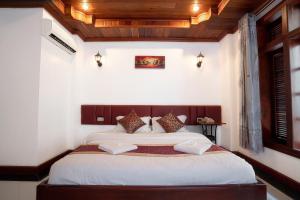 Postel nebo postele na pokoji v ubytování P5 Angkor Residence + 37 fotografií