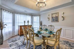 a dining room with a table and chairs at Covington Abode Less Than 30 Mi to Stone Mtn Park! in Covington