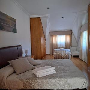 Postel nebo postele na pokoji v ubytování Casa Reibon
