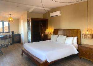Cama ou camas em um quarto em Magnolia Inn