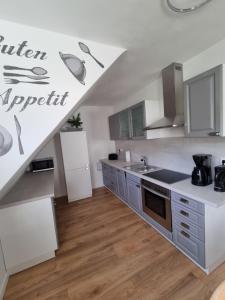 Kuchyň nebo kuchyňský kout v ubytování Ferienwohnung bei Natie