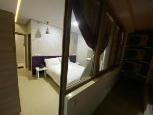 Postel nebo postele na pokoji v ubytování HOTEL CHARk