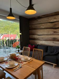 Posedenie v ubytovaní Apartamenty Olimpijska 1B & 1T