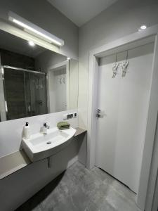 Kúpeľňa v ubytovaní Apartamenty Olimpijska 1B & 1T