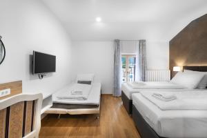 Hotel Dvorec客房内的一张或多张床位