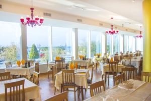 En restaurang eller annat matställe på Hotel Massimo Resort
