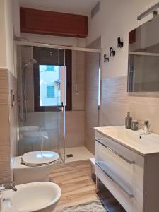 Ванна кімната в Appartamento Poli