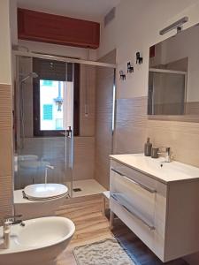 Ванна кімната в Appartamento Poli