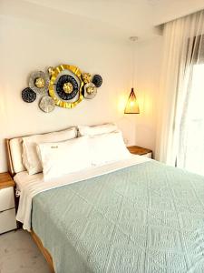 Posteľ alebo postele v izbe v ubytovaní Lux Suite Sea Front Avra