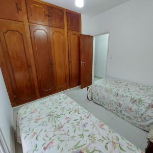 Un ou plusieurs lits dans un hébergement de l'établissement Praia do Morro Guarapari