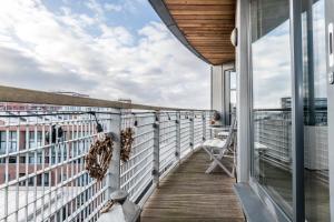 a balcony with a view of the city at Host & Stay - The Baltic Penthouse with Balcony in Liverpool