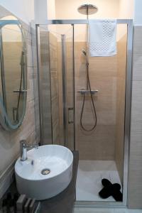 Koupelna v ubytování Le margherite B&B + 22 fotografií