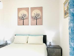 Posteľ alebo postele v izbe v ubytovaní Villa Kate Pula Sardegna