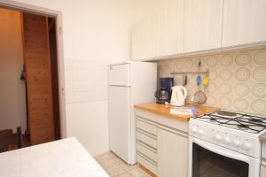 Kuchyň nebo kuchyňský kout v ubytování Apartment Selce 2379a