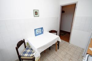 Postel nebo postele na pokoji v ubytování Apartment Selce 2379a
