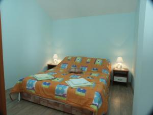Postel nebo postele na pokoji v ubytování Apartment Crikvenica 2354d