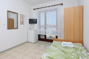 Postel nebo postele na pokoji v ubytování Twin Room Selce 2362a