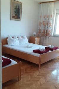 Posteľ alebo postele v izbe v ubytovaní Apartments by the sea Dramalj, Crikvenica - 2376