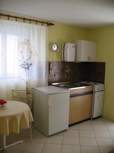 a kitchen with a sink and a counter top at Studio Novi Vinodolski 2382a in Novi Vinodolski