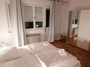 Posteľ alebo postele v izbe v ubytovaní Apartments with parking spaces Selce, Crikvenica - 2381