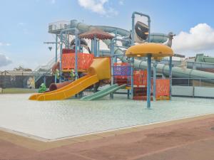 a water park with a slide and a water slide at V48 The Cwtch in Burnham on Sea